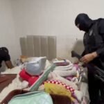 Agentes durante busca da Operacao Exarmatio