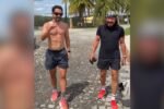 Everton Ribeiro e Bell Marques caminhando juntos em fazenda