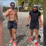 Everton Ribeiro e Bell Marques caminhando juntos em fazenda