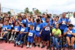 Atletas do Festival de Paradesporto da Bahia reunidos na pista